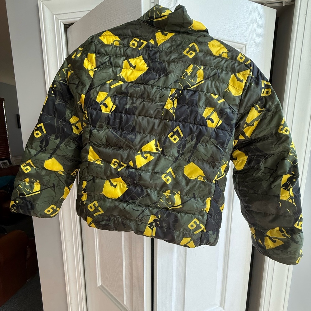 Kids Polo Reversible Camouflage lightweight Puffer Jacket with Yellow 67 design.